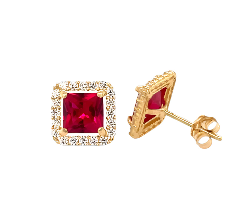 14k gold push back earrings with clear stone in the middle and on the border