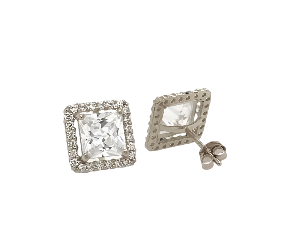 14k gold push back earrings with clear stone in the middle and on the border