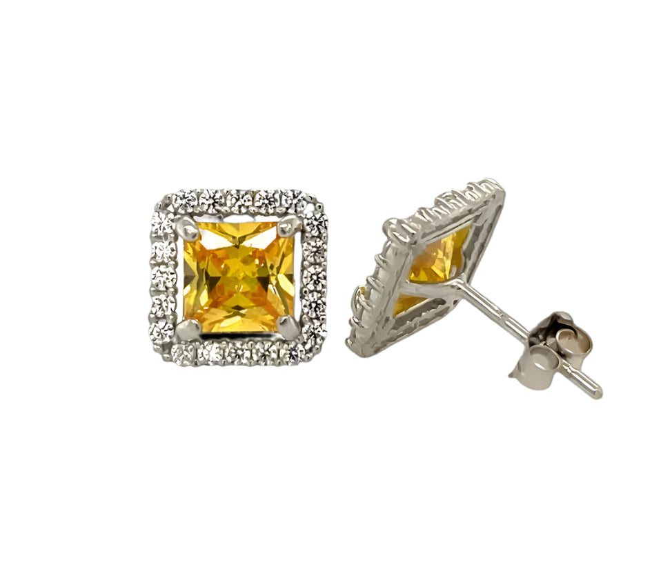 14k gold push back earrings with clear stone in the middle and on the border